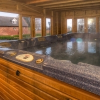 Swim spa in a purpose built garden house for use all year round TBHC